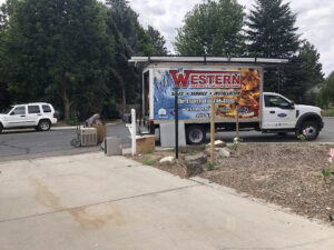 Western Heating Truck in front of our house